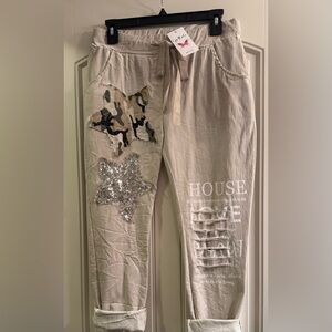 Gigi Moda Italian pants in a One Size Fits All.  Stretchy and comfortable. NWT